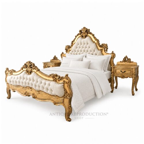 Ornate gold French Baroque upholstered bed with two matching bedside tables and white bedding.