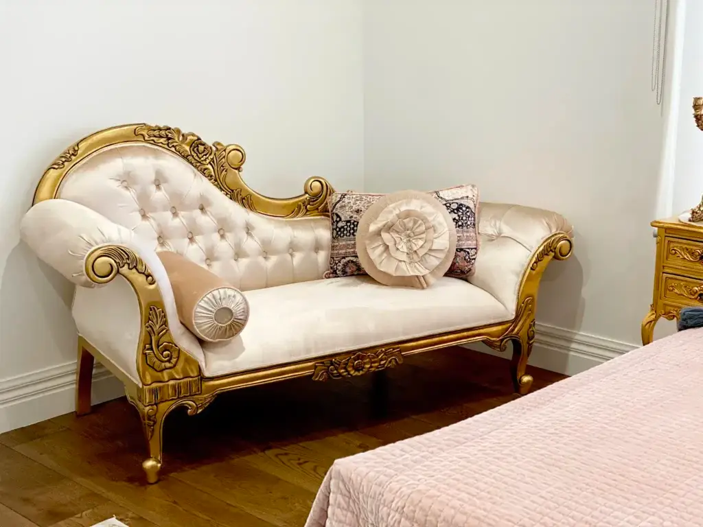 Customer Delivery Story – Hillside, Victoria
At The Antique Reproduction Shop, some projects stay with us long after completion — not only because of their scale, but because of the people and the shared creative journey behind them. 
This Hillside, Victoria home is one of those standout projects. 

A full dream-home fit-out for long-standing clients, this residence was thoughtfully furnished with French Provincial, antique, and Baroque-inspired furniture, resulting in a home that feels cohesive, elegant, and deeply personal. 

A Home Built with Intention and Craft
Our clients — a genuinely wonderful couple — approached this project with clarity and passion. The husband, who works in concrete and construction, personally built their home, ensuring every architectural detail was intentional. 

They wanted their interiors to feel: 

Elevated and elegant 
Cohesive throughout multiple levels
Timeless rather than trend-driven  
From the very beginning, it was clear they had a strong understanding of scale, proportion, and finishes, making the design process both collaborative and inspiring. 

A Refined Vision & Timeless Aesthetic
Their design vision was anchored in a love for: 

French Provincial styling
Antique and Baroque detailing
Rich antique gold finishes 
The colour palette flowed softly through the home, featuring: 

Antique gold
Neutral creams
Latte tones
Warm, soft browns 
With its open-plan layout, grand proportions, and abundant natural light, the home provided the perfect canvas for layered, luxurious furniture styling. 

Living Spaces Designed to Feel Grand Yet Inviting

Image: This is a photo of the Rococo Baroque lounge suite in antique gold, styled as a grand living space


Image: This is a photo of the Rococo Baroque lounge suite in antique gold, styled as a grand living space


Image: This is a photo of the French Provincial upholstered settee with an intricately carved antique gold frame

The home features three distinct living areas, each with its own personality while maintaining visual harmony.

From the dramatic Rococo Baroque lounge suite to softer Provincial seating moments, each space feels intentional, elegant, and welcoming — never overdone.

A Grand Dining Experience

Image: This is a photo of the French Provincial dining table paired with upholstered dining chairs in an antique gold finish

Dining areas were designed to feel opulent yet warm. The pairing of sculptural tables with upholstered chairs allows the space to feel formal while remaining inviting — ideal for both entertaining and everyday family life.

Bedroom Spaces with Personality and Softness
Products Featured In This Blog

Image: This is a photo of the French Baroque bed styled with matching bedside tables in antique gold


This is a photo of the French Provincial chaise lounge finished in antique gold with refined upholstered seating