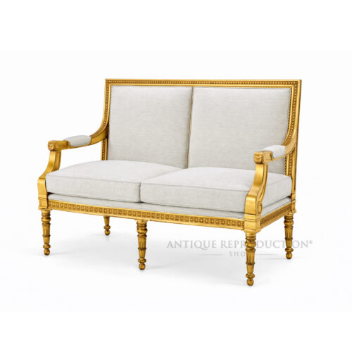 Versailles French gold 2 seater sofa with neutral upholstery, fluted legs and carved mahogany frame